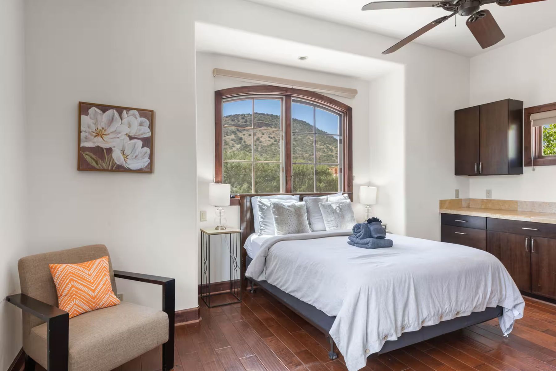 Queen bedroom with mountain view window